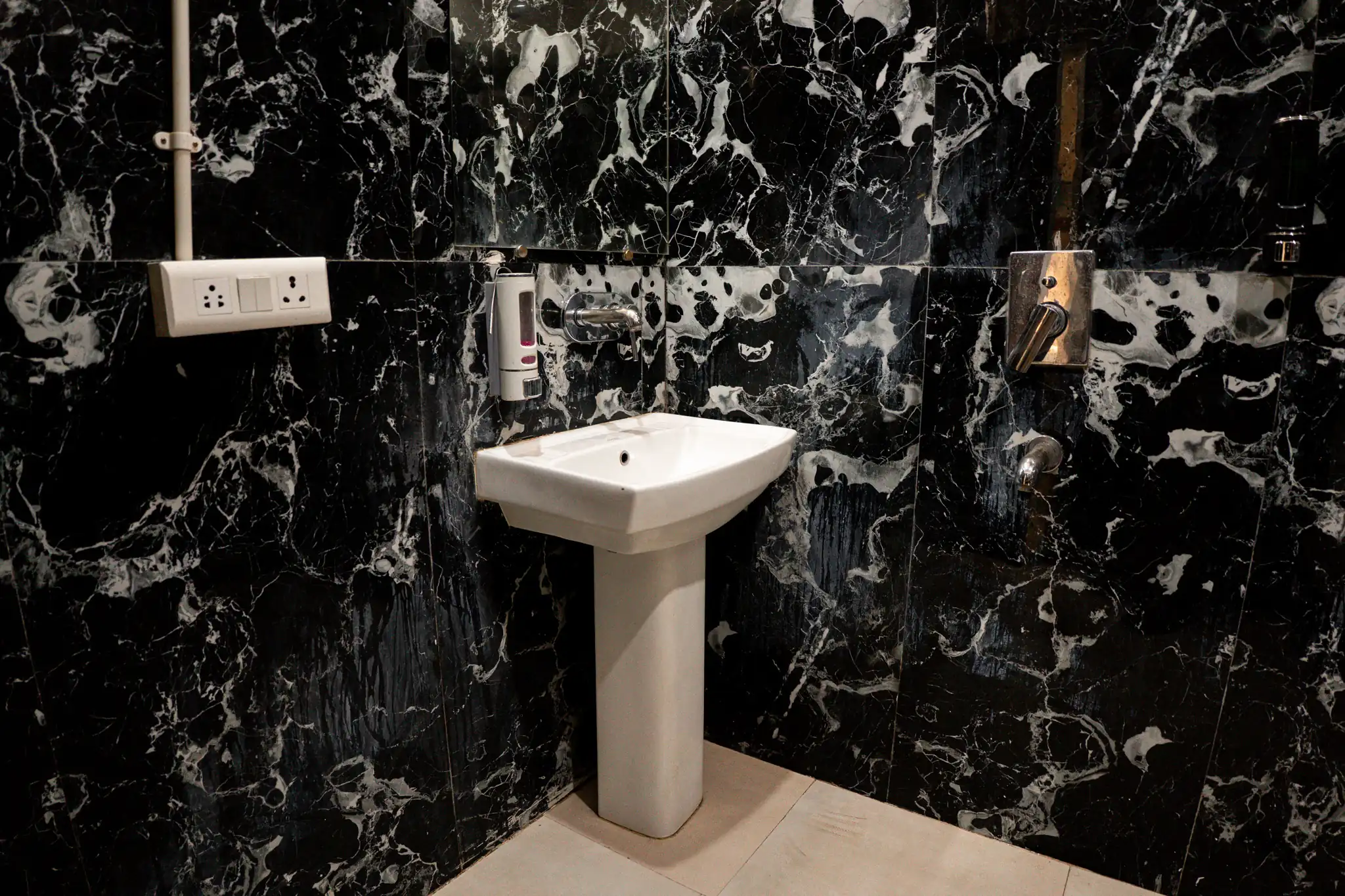 En suite bathroom in Deluxe Room at Trippme Rishikesh